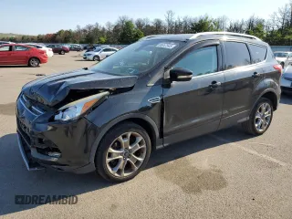 2015 Ford Escape Titanium with VIN 1FMCU0J95FUB59026, listed as a Copart auction lot 65047545 with 84,259 mi miles and Salvage title. Bid and sale history available at DreamBid. Image 1.