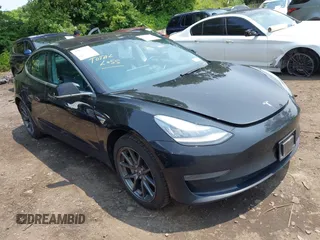 2018 Tesla Model 3 Long Range Battery z VIN 5YJ3E1EA2JF021098, wystawiony jako IAAI lot #42395123 z przebiegiem 85 496 mil mil oraz . Historia ofert i sprzedaży dostępna na DreamBid. Obrazek 1.