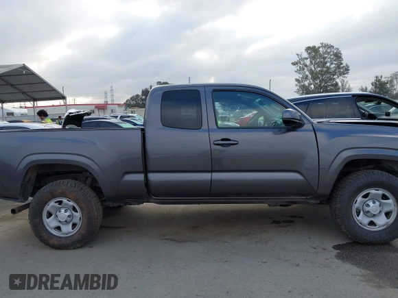 2022 Toyota Tacoma SR with VIN 3TYSX5EN8NT016817, listed as a IAAI auction lot 42140136 with 52,825 mi miles and . Bid and sale history available at DreamBid. Image 12.