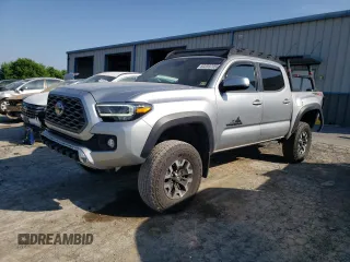 2022 Toyota Tacoma SR with VIN 3TYCZ5AN4NT061063, listed as a Copart auction lot 60259795 with 43,090 mi miles and Salvage title. Bid and sale history available at DreamBid. Image 1.
