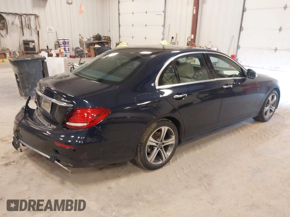 2018 Mercedes-Benz E with VIN WDDZF4KB7JA382850, listed as a IAAI auction lot 41991305 with 56,187 mi miles. Bid and sale history available at carsss.com. Image 4.