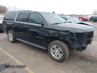 2019 Chevrolet Suburban LT with VIN 1GNSKHKC0KR159583, listed as a IAAI auction lot 41309350 with 196,844 mi miles. Bid and sale history available at carsss.com. Image 1.