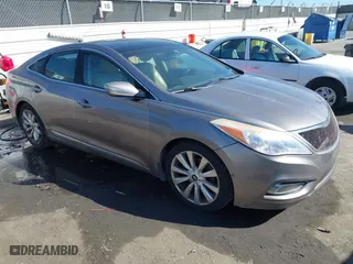 2013 Hyundai Azera with VIN KMHFH4JG9DA281474, listed as a IAAI auction lot 41881401 with 142,219 mi miles. Bid and sale history available at carsss.com. Image 1.