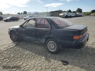 1993 Toyota Camry LE with VIN JT2SK12E4P0112014, listed as a Copart auction lot 52822095 with 249,458 mi miles and Salvage Title. Bid and sale history available at carsss.com. Image 2.