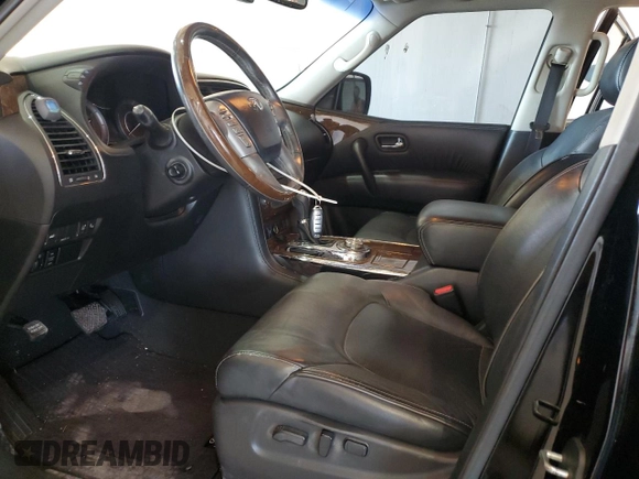 2016 Infiniti QX80 Limited with VIN JN8AZ2NE6G9123242, listed as a Copart auction lot 56198345 with 114,478 mi miles and Salvage title. Bid and sale history available at DreamBid. Image 7.