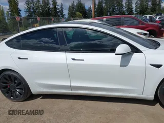 2021 Tesla Model 3 Performance with VIN 5YJ3E1EC2MF096681, listed as a IAAI auction lot 42068782 with 34,852 mi miles and . Bid and sale history available at DreamBid. Image 14.