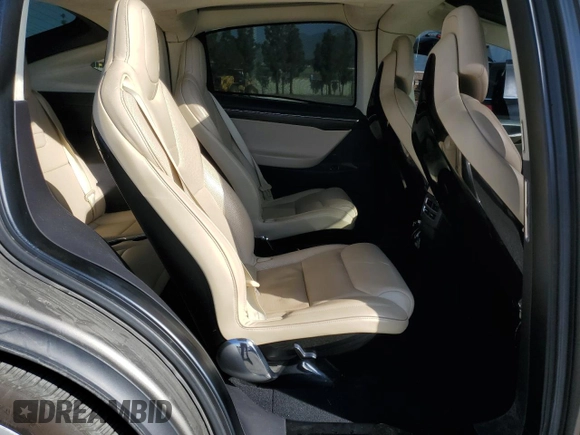 2016 Tesla Model X 70D z VIN 5YJXCBE23GF010836, wystawiony jako Copart lot #57512055 z przebiegiem 115 475 mil mil oraz Szkody całkowita. Historia ofert i sprzedaży dostępna na DreamBid. Obrazek 11.