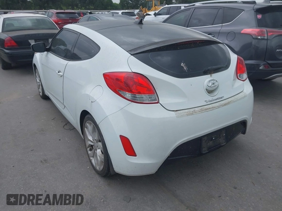 2013 Hyundai Veloster w/Black Int с VIN KMHTC6AD5DU166601, выставлен на аукционе IAAI как лот 42182995 с пробегом 143 106 миль миль и . История ставок и продаж доступна на DreamBid. Изображение 3.