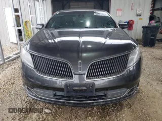 2016 Lincoln MKS z VIN 1LNHL9DK9GG601740, wystawiony jako Copart lot #60557565 z przebiegiem 89 350 mil mil oraz Szkoda całkowita • Salvage title. Historia ofert i sprzedaży dostępna na DreamBid. Obrazek 5.