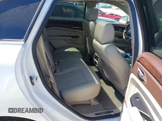 2014 Cadillac SRX Performance Collection with VIN 3GYFNFE35ES582897, listed as a IAAI auction lot 41978361 with 144,116 mi miles and . Bid and sale history available at DreamBid. Image 8.