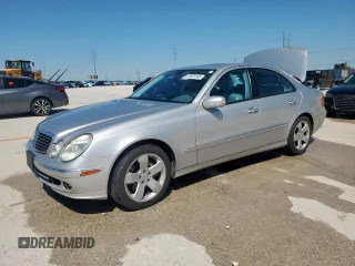 2005 Mercedes-Benz E 5.0L with VIN WDBUF70J95A718132, listed as a Copart auction lot 51620185 with 249,876 mi miles and Salvage Title. Bid and sale history available at carsss.com. Image 1.