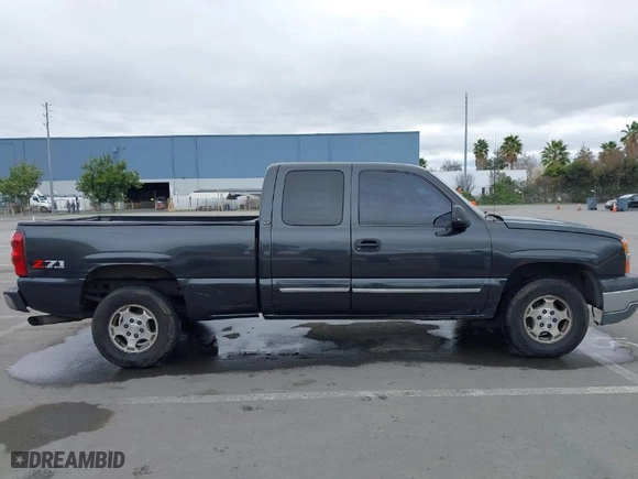 2003 Chevrolet Silverado 1500 LS with VIN 1GCEK19TX3E107860, listed as a IAAI auction lot 41461401 with 379,055 mi miles. Bid and sale history available at carsss.com. Image 13.