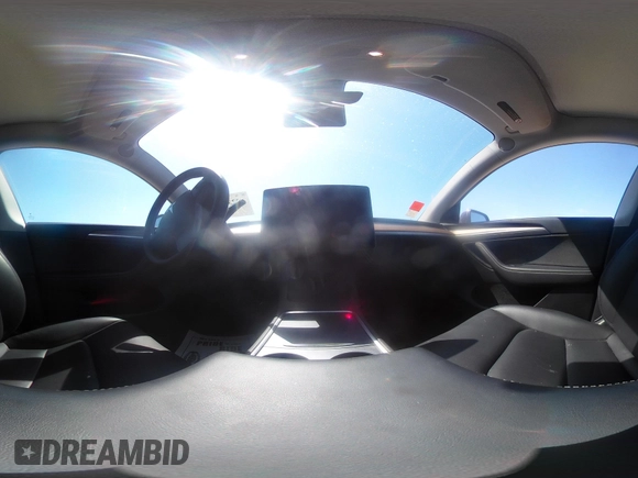 2023 Tesla Model Y Long Range with VIN 7SAYGDEE4PA037218, listed as a IAAI auction lot 42232704 with 18,756 mi miles and . Bid and sale history available at DreamBid. Image 23.