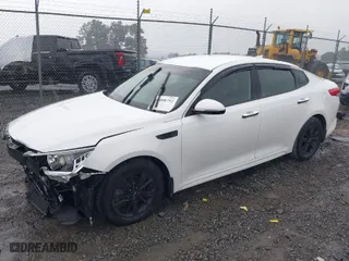 2018 Kia Optima S with VIN 5XXGT4L36JG209780, listed as a IAAI auction lot 40008792 with 97,575 mi miles. Bid and sale history available at carsss.com. Image 2.