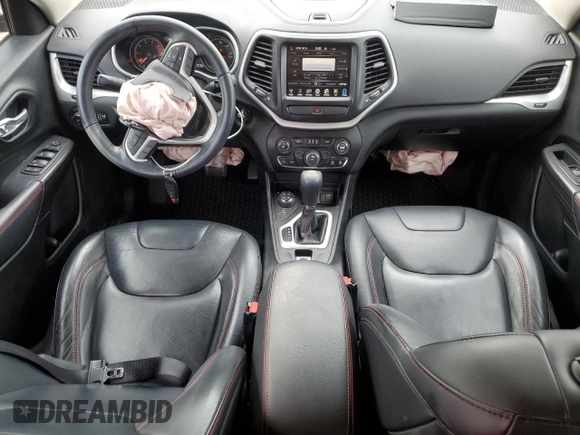 2016 Jeep Cherokee Trailhawk with VIN 1C4PJMBS4GW236966, listed as a Copart auction lot 63190565 with 101,017 mi miles and Salvage title. Bid and sale history available at DreamBid. Image 8.