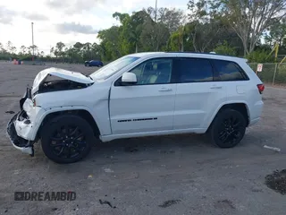 2022 Jeep Grand Cherokee WK Laredo X with VIN 1C4RJFAG8NC150575, listed as a IAAI auction lot 41198543 with 68,361 mi miles. Bid and sale history available at carsss.com. Image 14.