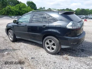 2006 Lexus RX 400h with VIN JTJGW31U560001666, listed as a IAAI auction lot 42257070 with 267,244 mi miles and . Bid and sale history available at DreamBid. Image 3.