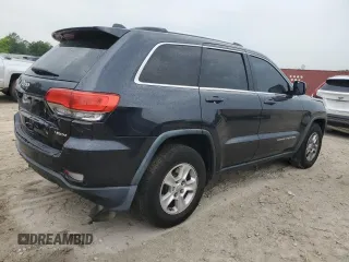 2014 Jeep Grand Cherokee Laredo with VIN 1C4RJEAGXEC130094, listed as a Copart auction lot 55997925 with 151,407 mi miles and Salvage Title. Bid and sale history available at DreamBid. Image 3.