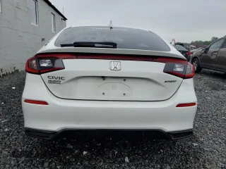 2023 Honda Civic Sport z VIN 19XFL2H88PE023552, wystawiony jako Copart lot #56878205 z przebiegiem 23 714 mil mil oraz Szkoda całkowita • Salvage title. Historia ofert i sprzedaży dostępna na DreamBid. Obrazek 6.