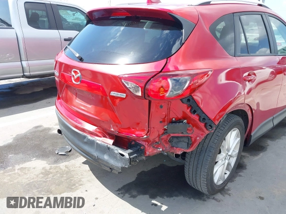 2015 Mazda CX-5 Grand Touring with VIN JM3KE2DY7F0537017, listed as a IAAI auction lot 41953011 with 78,098 mi miles. Bid and sale history available at carsss.com. Image 6.