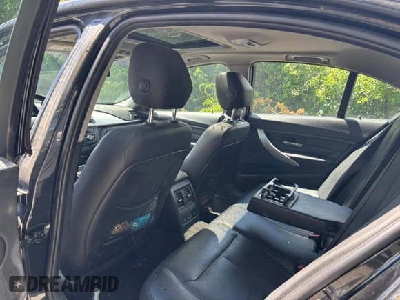2013 BMW 3 Series 328i xDrive with VIN WBA3B5G57DNS00448, listed as a Copart auction lot 63165005 with 190,464 mi miles and Clean title. Bid and sale history available at DreamBid. Image 6.