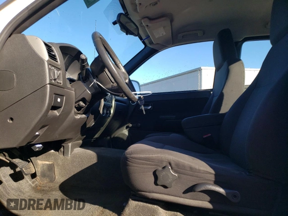 2012 Chevrolet Colorado Work Truck z VIN 1GCESBF98C8167892, wystawiony jako Copart lot #86172434 z przebiegiem 98 857 mil mil oraz Czysty tytuł • Clean title. Historia ofert i sprzedaży dostępna na DreamBid. Obrazek 7.