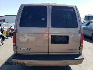 1996 GMC Safari with VIN 1GKDM19W3TB510312, listed as a Copart auction lot 69528134 with 106,226 mi miles and Salvage Title. Bid and sale history available at carsss.com. Image 6.