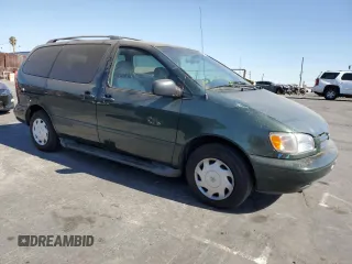 2000 Toyota Sienna LE with VIN 4T3ZF13C5YU250522, listed as a Copart auction lot 80117884 with 155,009 mi miles and Salvage Title. Bid and sale history available at carsss.com. Image 4.