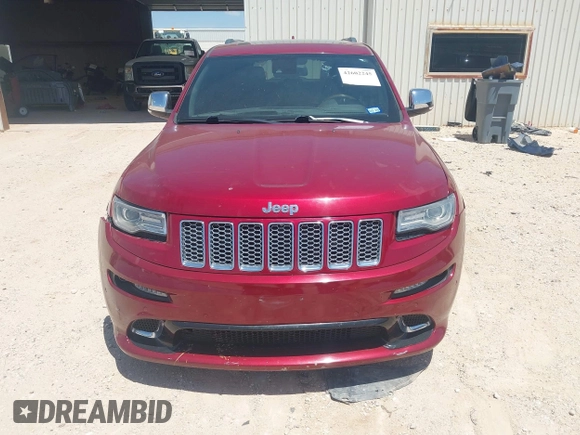 2014 Jeep Grand Cherokee Summit with VIN 1C4RJFJT1EC237358, listed as a IAAI auction lot 42602245 with 106,821 mi miles and . Bid and sale history available at DreamBid. Image 12.