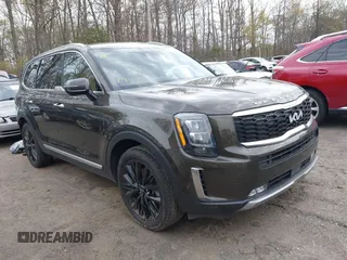 2022 Kia Telluride SX z VIN 5XYP54HC4NG271392, wystawiony jako IAAI lot #42019407 z przebiegiem 50 971 mil mil oraz . Historia ofert i sprzedaży dostępna na DreamBid. Obrazek 1.