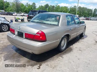 2001 Mercury Grand Marquis LS z VIN 2MEFM75W31X704182, wystawiony jako IAAI lot #42086175 z przebiegiem 177 892 mil mil oraz . Historia ofert i sprzedaży dostępna na DreamBid. Obrazek 4.
