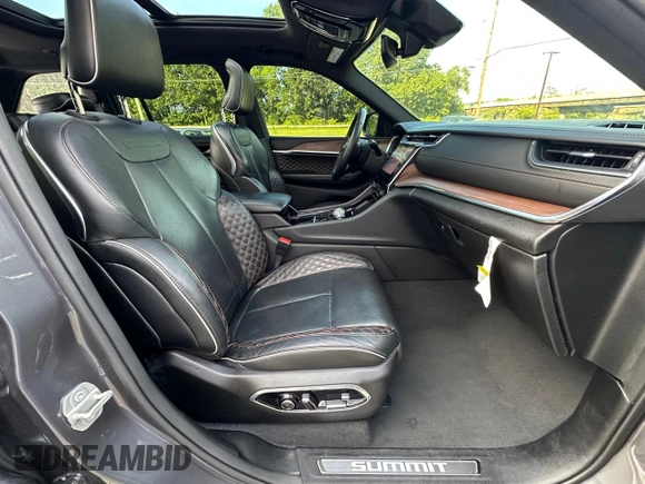 2023 Jeep Grand Cherokee Summit with VIN 1C4RJHEG2P8882566, listed as a Copart auction lot 65095905 with 59,970 mi miles and Salvage title. Bid and sale history available at DreamBid. Image 5.