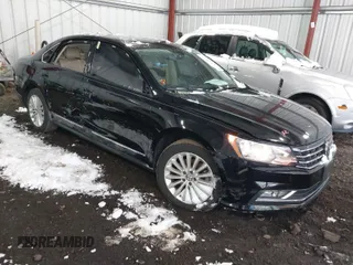 2016 Volkswagen Passat 1.8T SE with VIN 1VWBT7A35GC066566, listed as a IAAI auction lot 41592644 with 102,676 mi miles. Bid and sale history available at carsss.com. Image 1.