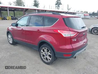 2013 Ford Escape SE with VIN 1FMCU9GXXDUB73916, listed as a IAAI auction lot 42086263 with 176,226 mi miles and . Bid and sale history available at DreamBid. Image 3.