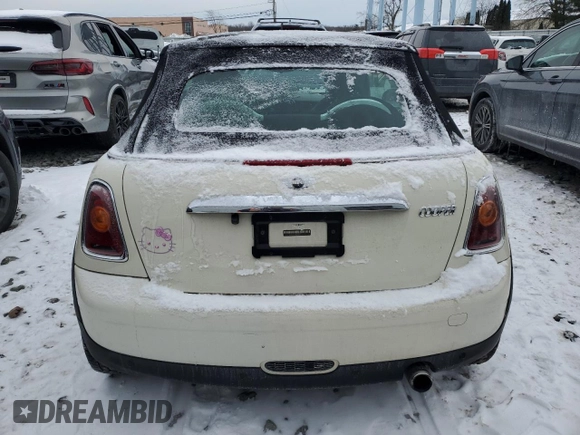 2010 MINI Convertible with VIN WMWMR3C50ATU97287, listed as a Copart auction lot 89116615 with 120,323 mi miles and Salvage Title. Bid and sale history available at DreamBid. Image 6.