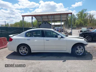 2005 Infiniti G35 with VIN JNKCV51F05M311537, listed as a IAAI auction lot 42051242 with 205,105 mi miles and . Bid and sale history available at carsss.com. Image 14.