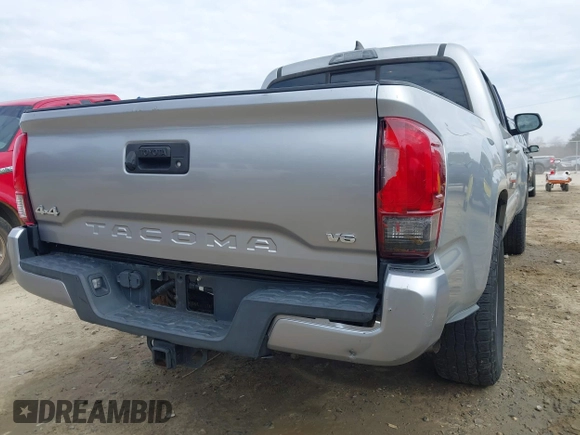 2018 Toyota Tacoma SR with VIN 3TMCZ5AN4JM130307, listed as a IAAI auction lot 41541477 with 74,369 mi miles and . Bid and sale history available at DreamBid. Image 20.