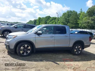 2020 Honda Ridgeline RTL with VIN 5FPYK3F5XLB025857, listed as a IAAI auction lot 42307343 with 97,262 mi miles and . Bid and sale history available at DreamBid. Image 14.