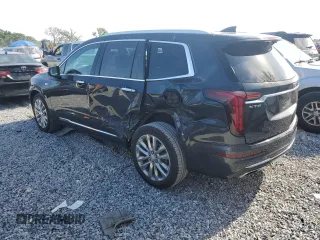 2021 Cadillac XT6 Premium Luxury with VIN 1GYKPCRS1MZ199288, listed as a Copart auction lot 54264995 with 51,432 mi miles and Salvage Title. Bid and sale history available at carsss.com. Image 2.