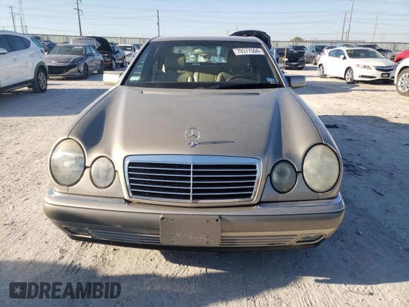 1996 Mercedes-Benz E-Class with VIN WDBJF55F7TJ022765, listed as a Copart auction lot 70577504 with 186,340 mi miles and Salvage Title. Bid and sale history available at carsss.com. Image 5.