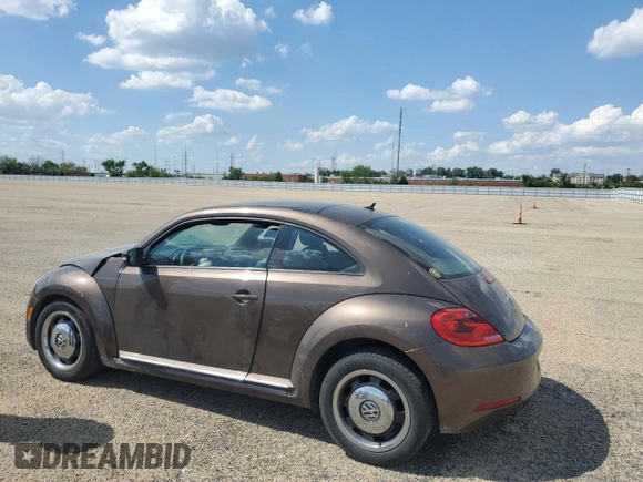 2012 Volkswagen Beetle 2.5L with VIN 3VWHX7AT2CM616099, listed as a Copart auction lot 56421455 with 225,279 mi miles and Salvage title. Bid and sale history available at DreamBid. Image 2.