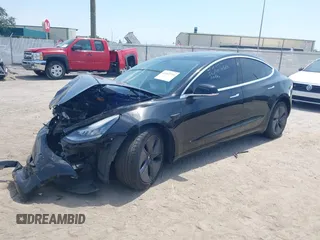 2020 Tesla Model 3 Standard Range Plus z VIN 5YJ3E1EA9LF738102, wystawiony jako IAAI lot #42107744 z przebiegiem 73 294 mil mil oraz . Historia ofert i sprzedaży dostępna na DreamBid. Obrazek 18.