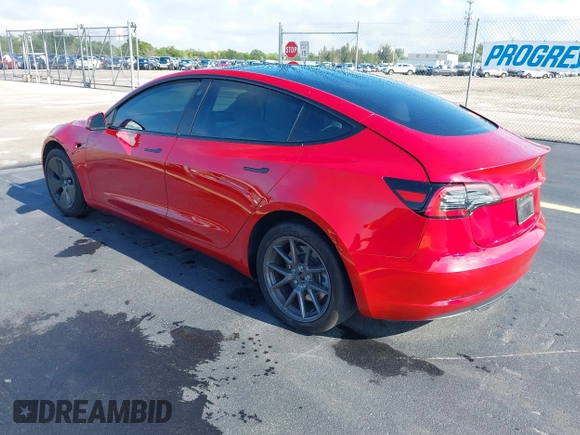 2023 Tesla Model 3 with VIN 5YJ3E1EA2PF588467, listed as a IAAI auction lot 42254921 with 11,217 mi miles and . Bid and sale history available at DreamBid. Image 3.
