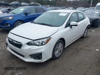 2017 Subaru Impreza Premium with VIN 4S3GKAB61H3612332, listed as a IAAI auction lot 41844756 with 118,754 mi miles. Bid and sale history available at carsss.com. Image 2.