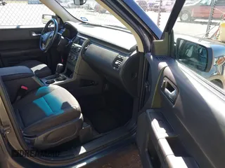 2016 Ford Flex SE with VIN 2FMGK5B89GBA18817, listed as a IAAI auction lot 41849047 with 150,807 mi miles. Bid and sale history available at carsss.com. Image 5.