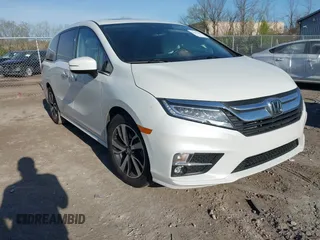 2020 Honda Odyssey Elite with VIN 5FNRL6H92LB014671, listed as a IAAI auction lot 42110389 with 104,180 mi miles and . Bid and sale history available at DreamBid. Image 1.