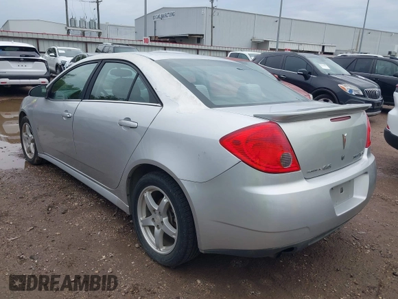 2009 Pontiac G6 1SB with VIN 1G2ZJ57K094243360, listed as a IAAI auction lot 41904278 with 144,346 mi miles and . Bid and sale history available at DreamBid. Image 3.