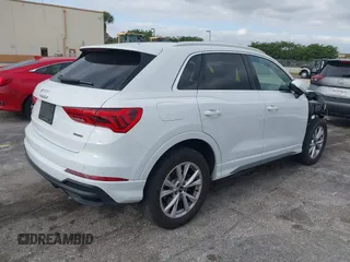 2024 Audi Q3 S line Premium with VIN WA1DECF31R1057900, listed as a IAAI auction lot 42059219 with 27,635 mi miles. Bid and sale history available at carsss.com. Image 4.