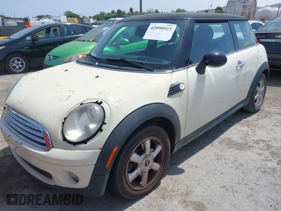 2009 MINI Cooper Hardtop with VIN WMWMF33569TU75508, listed as a IAAI auction lot 42090523 with 247,856 mi miles. Bid and sale history available at carsss.com. Image 2.