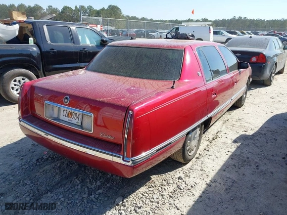 1996 Cadillac DeVille with VIN 1G6KD52Y0TU301560, listed as a IAAI auction lot 41820533 with 1 mi miles. Bid and sale history available at carsss.com. Image 4.